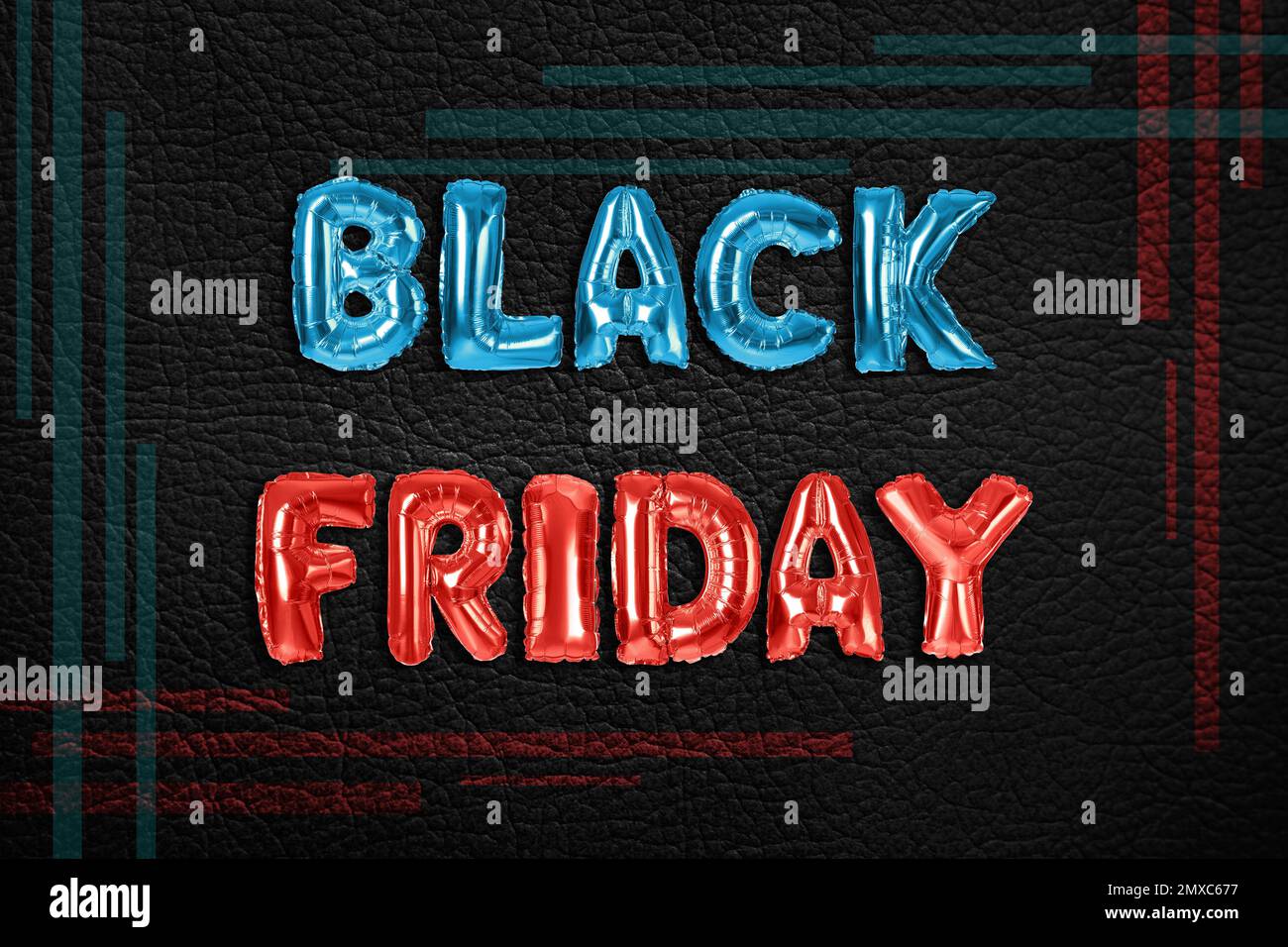 Phrase BLACK FRIDAY made of foil balloon letters on dark background Stock Photo