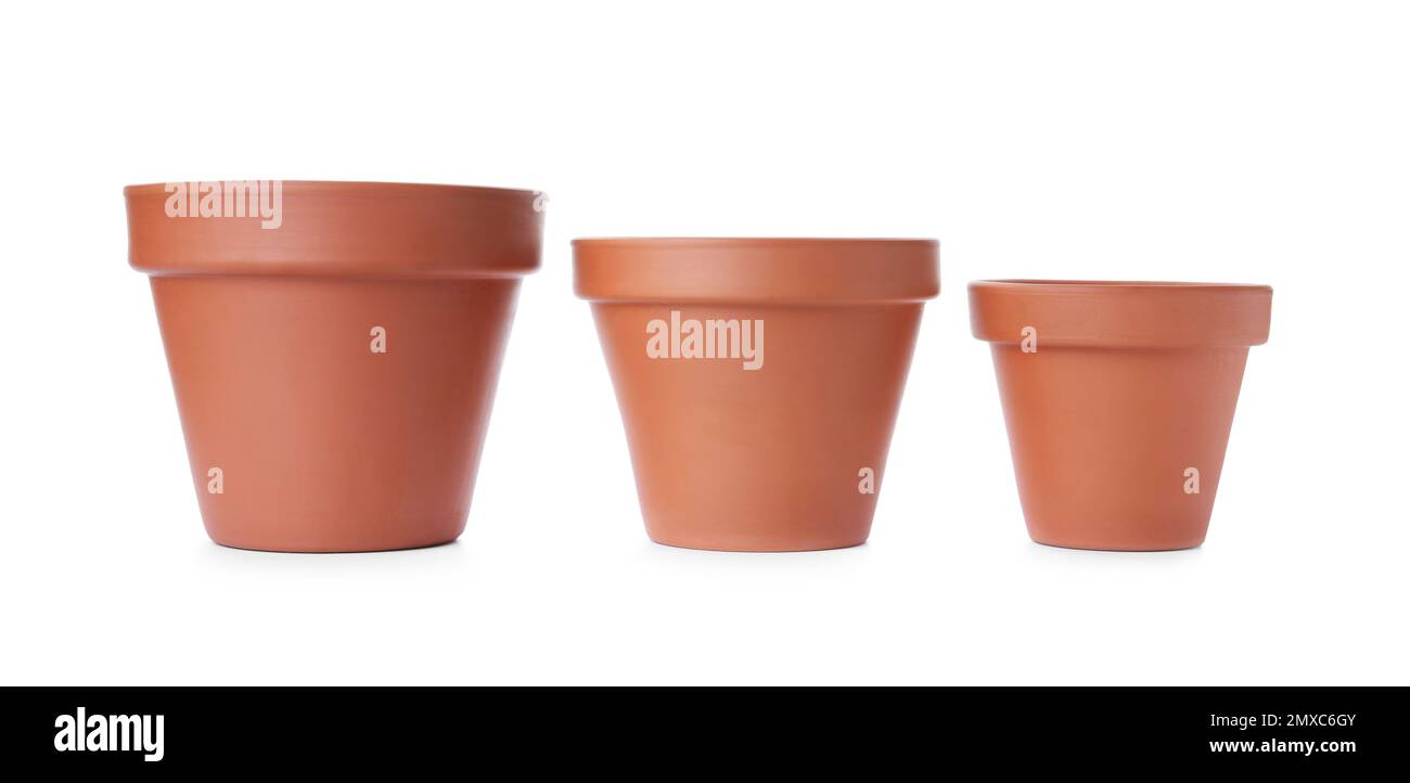 Stylish terracotta flower pots isolated on white Stock Photo Alamy