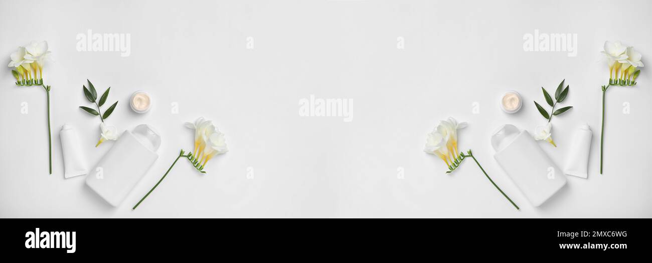 Flat lay composition with cosmetic products on light background, space ...