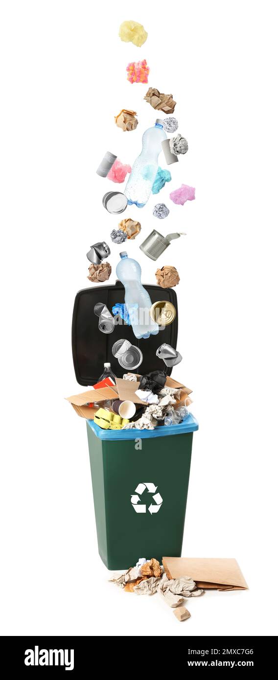 Different garbage falling into trash bin. Waste management and recycling Stock Photo Alamy