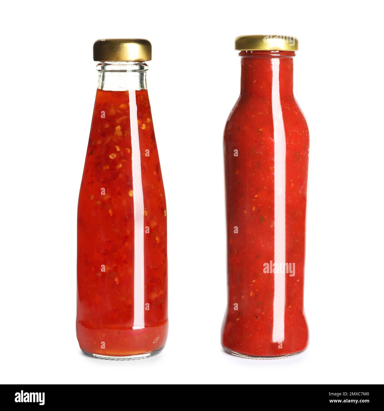 Delicious sauces in glass bottles on white background Stock Photo Alamy