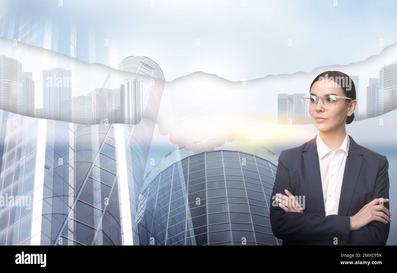 Multiple exposure of businesswoman, partners shaking hands and cityscape Stock Photo