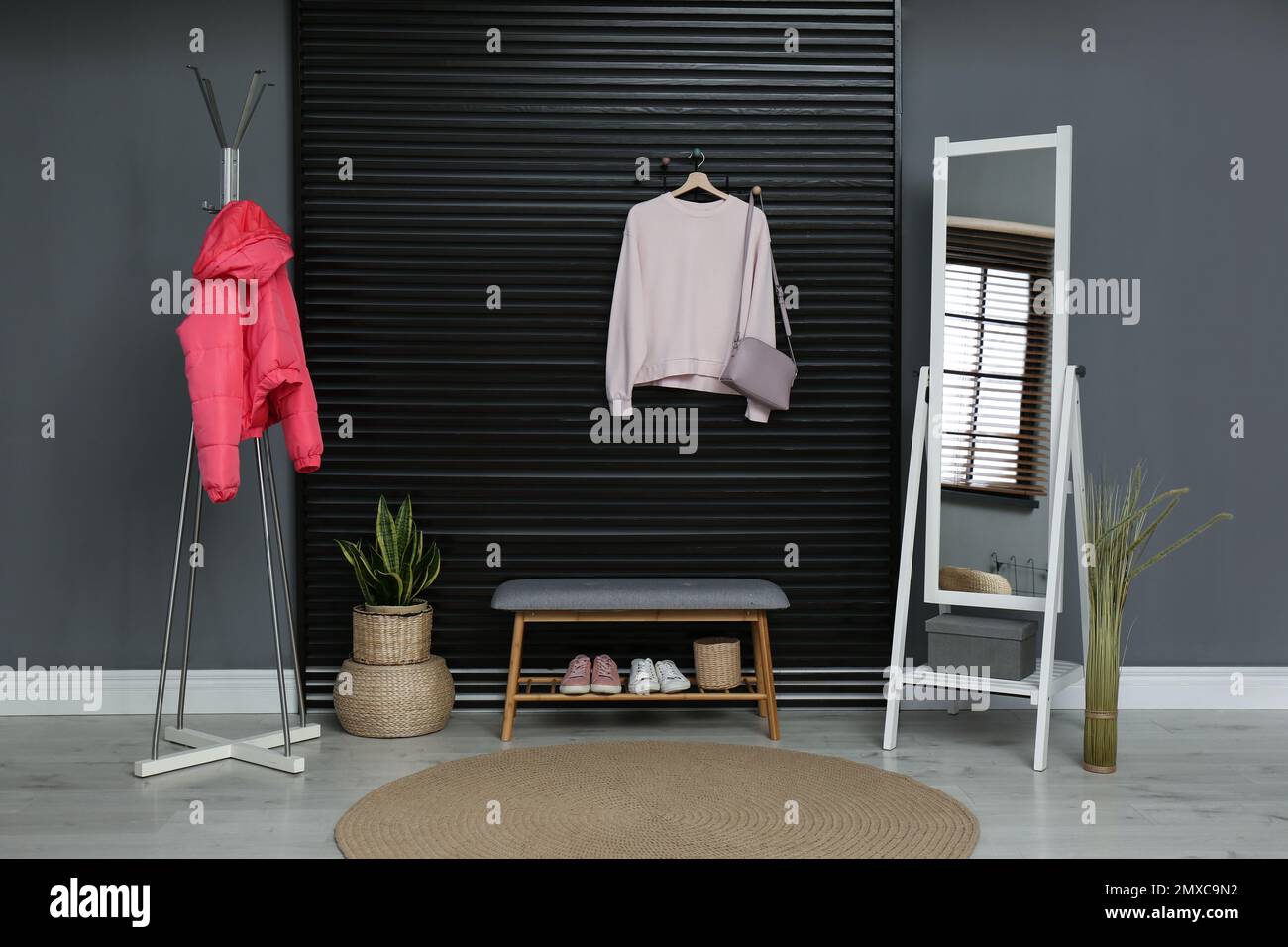 Hallway interior with stylish furniture, clothes and accessories Stock ...
