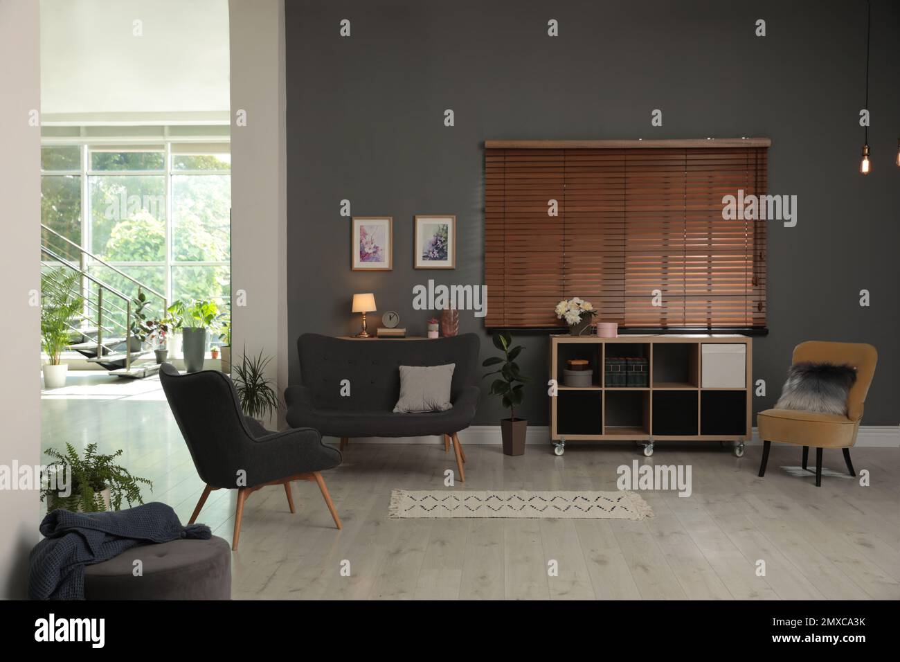 Stylish living room and hall in spacious house. Interior design Stock ...