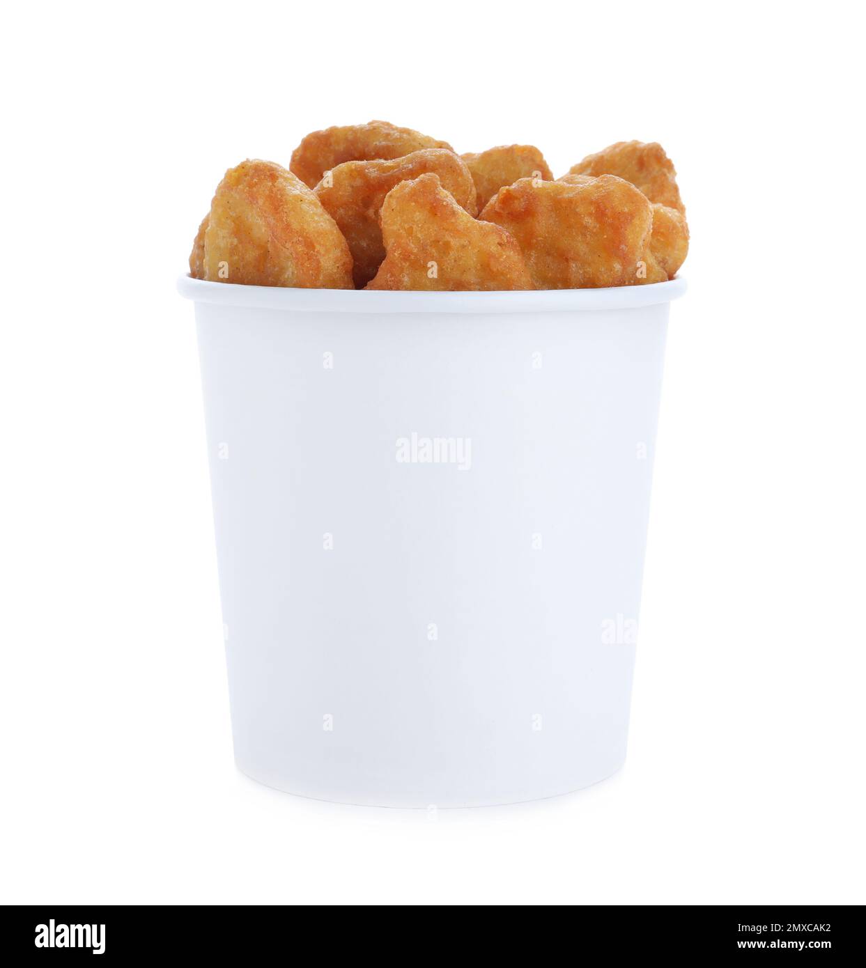 Bucket with tasty chicken nuggets isolated on white Stock Photo