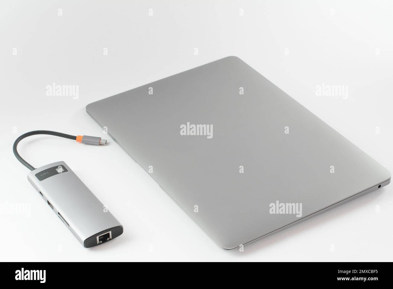 USB adapter connected to laptop with different inputs for flash drive