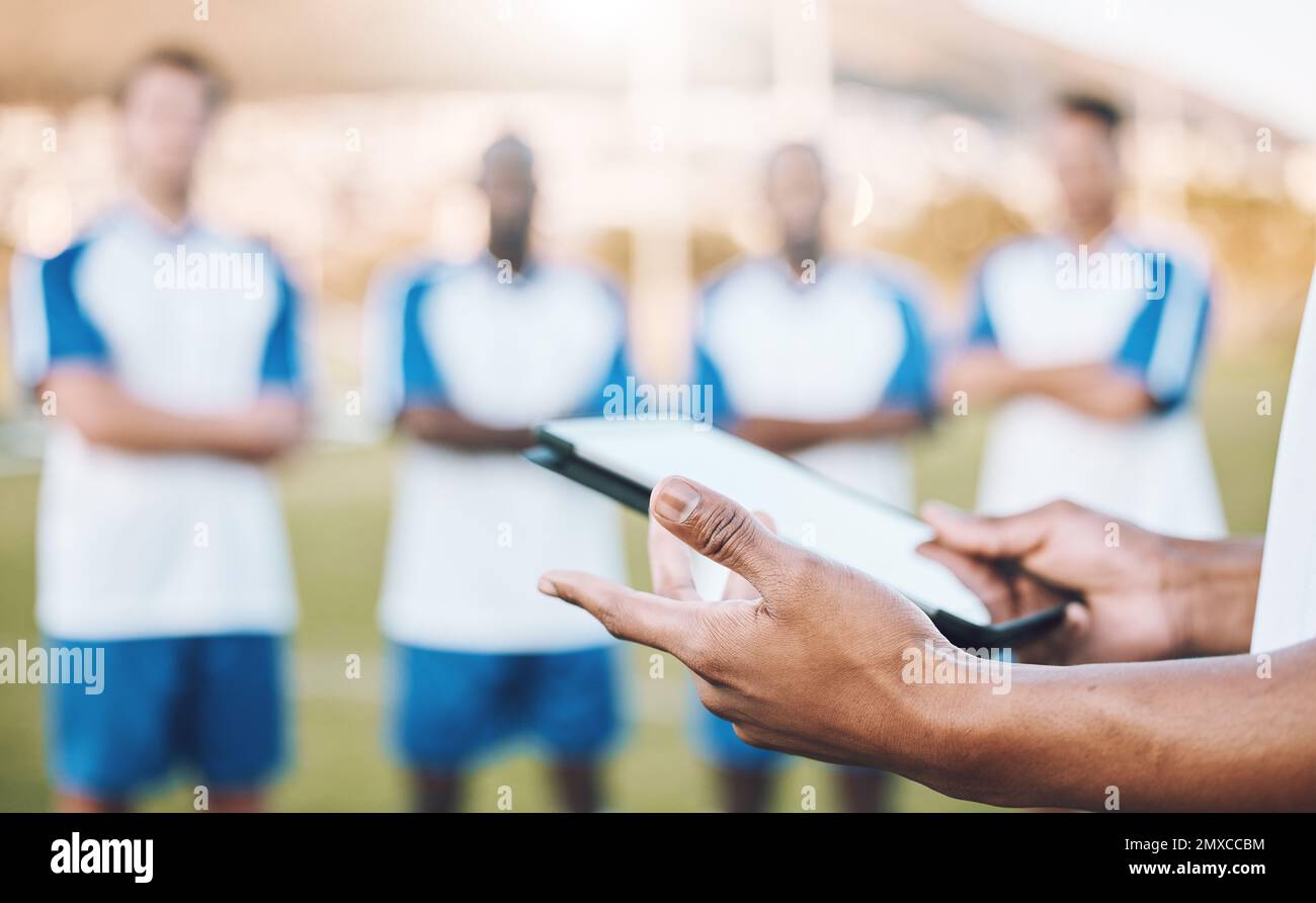 football-soccer-and-team-statistics-on-a-tablet-and-coach-analysis