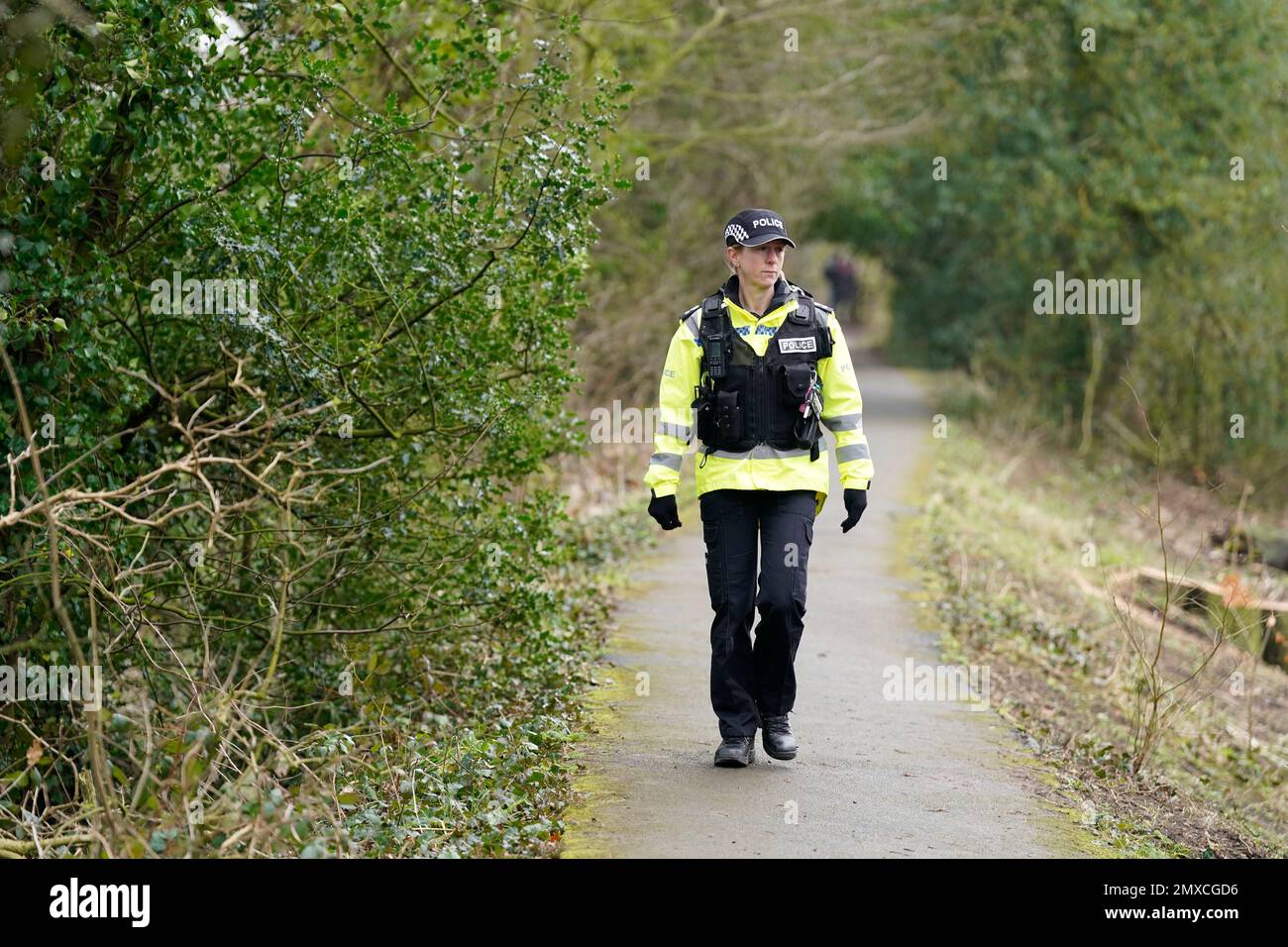 A police officer in St Michael's on Wyre, Lancashire, as police continue their search for missing woman Nicola Bulley, 45, who was last seen on the morning of Friday January 27, when she was spotted walking her dog on a footpath by the nearby River Wyre. Picture date: Friday February 3, 2023. Stock Photo