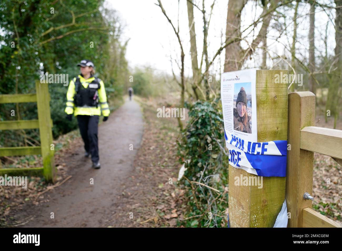 A police officer in St Michael's on Wyre, Lancashire, as police continue their search for missing woman Nicola Bulley, 45, who was last seen on the morning of Friday January 27, when she was spotted walking her dog on a footpath by the nearby River Wyre. Picture date: Friday February 3, 2023. Stock Photo