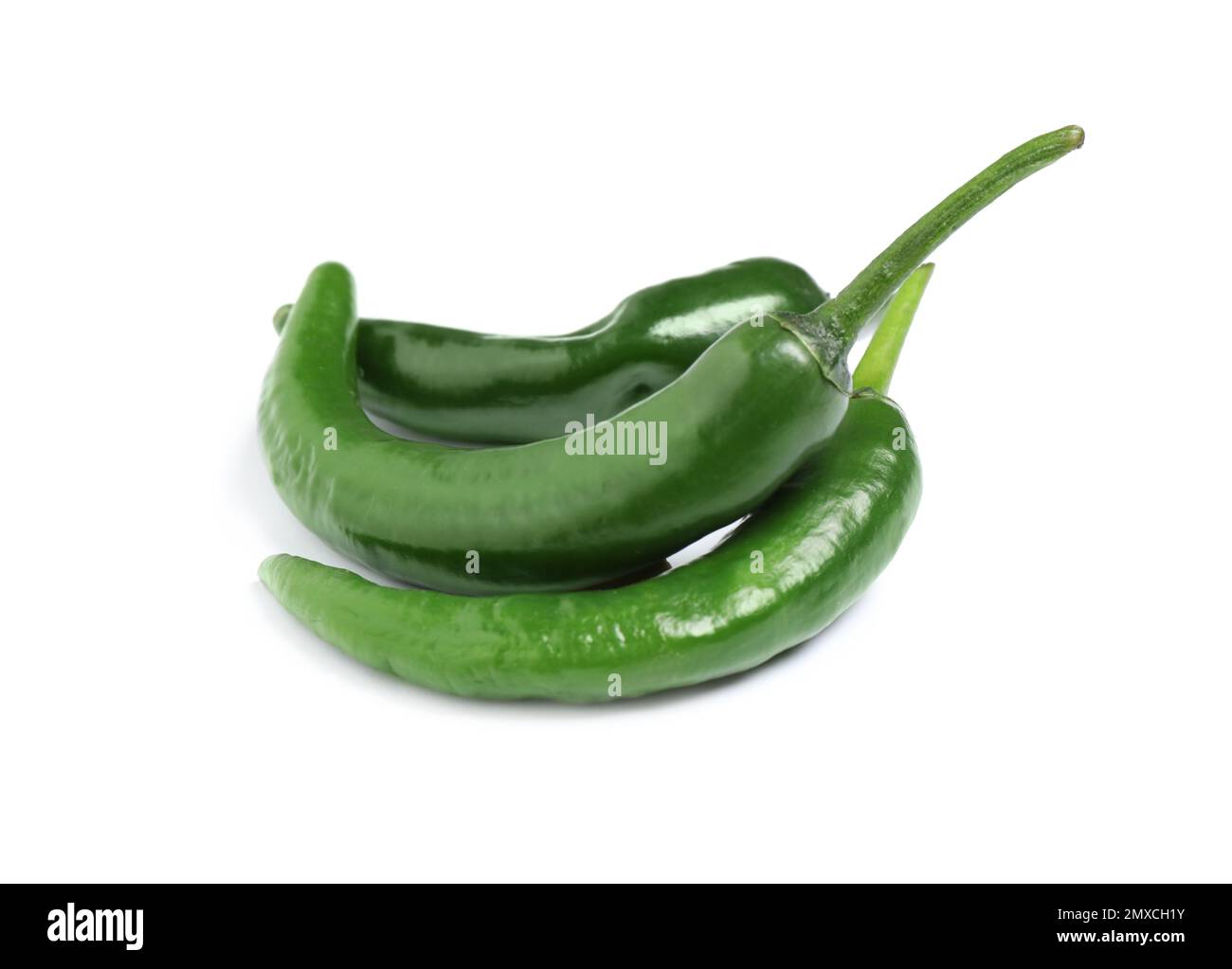 Green hot chili peppers on white background Stock Photo - Alamy