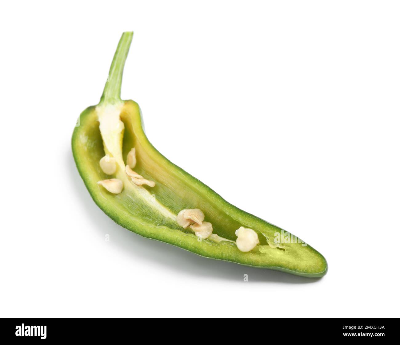 Cut green hot chili pepper on white background Stock Photo - Alamy