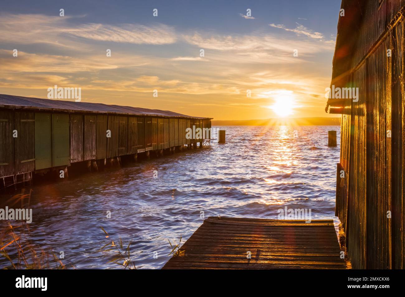 The golden sunset on the beach on a summer day Stock Photo - Alamy