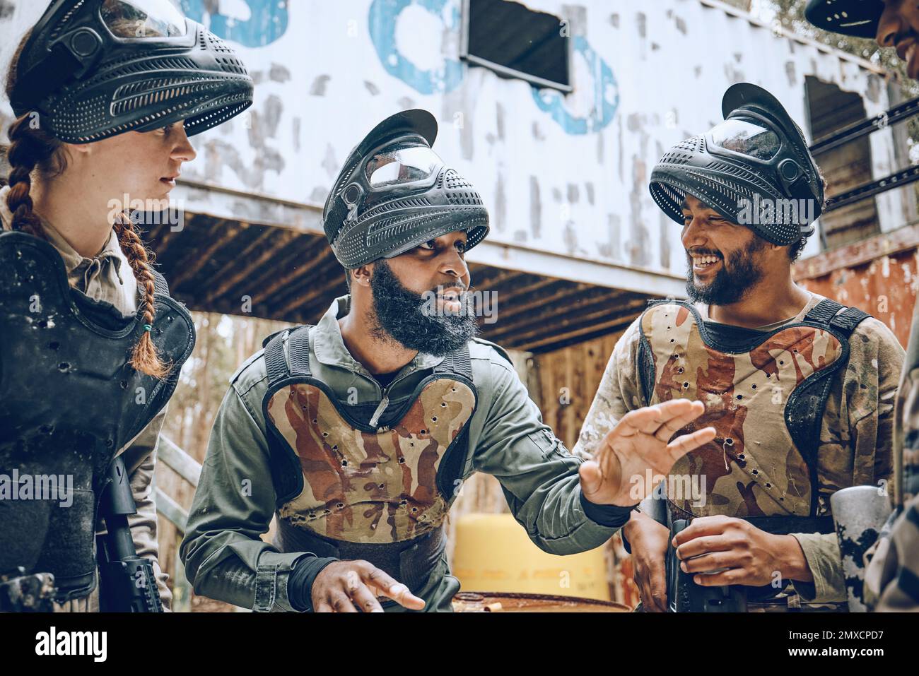 Paintball team, friends and planning strategy for a game while talking