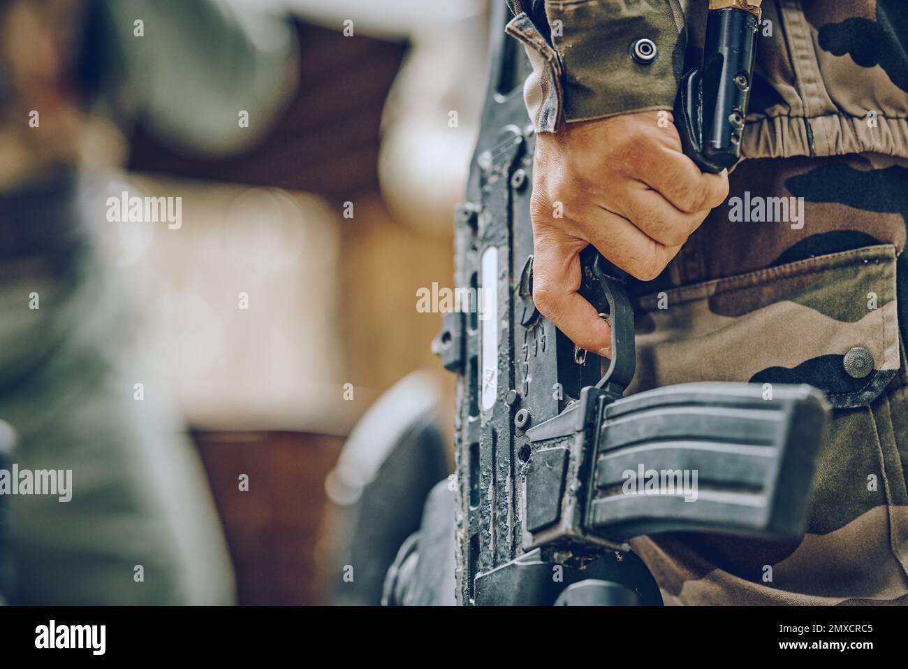 Weapons in hands man hi-res stock photography and images - Alamy