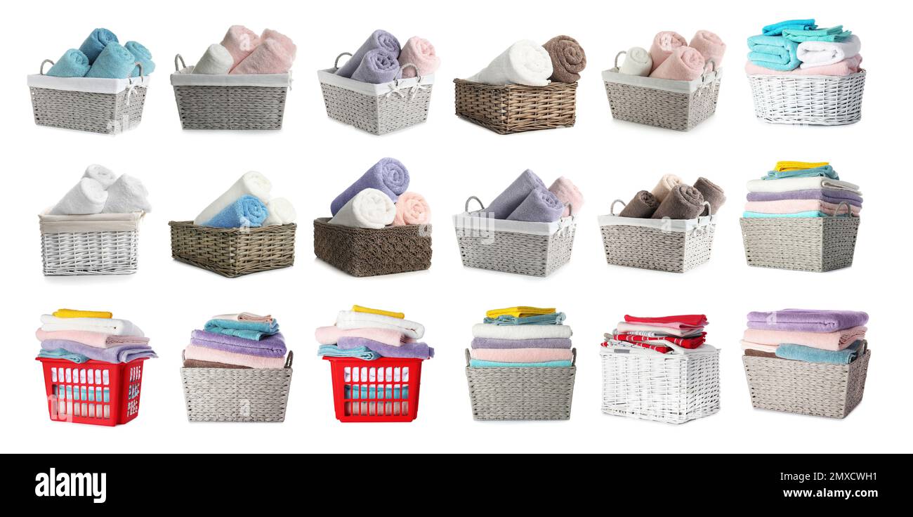 Set of different baskets with towels on white background Stock Photo