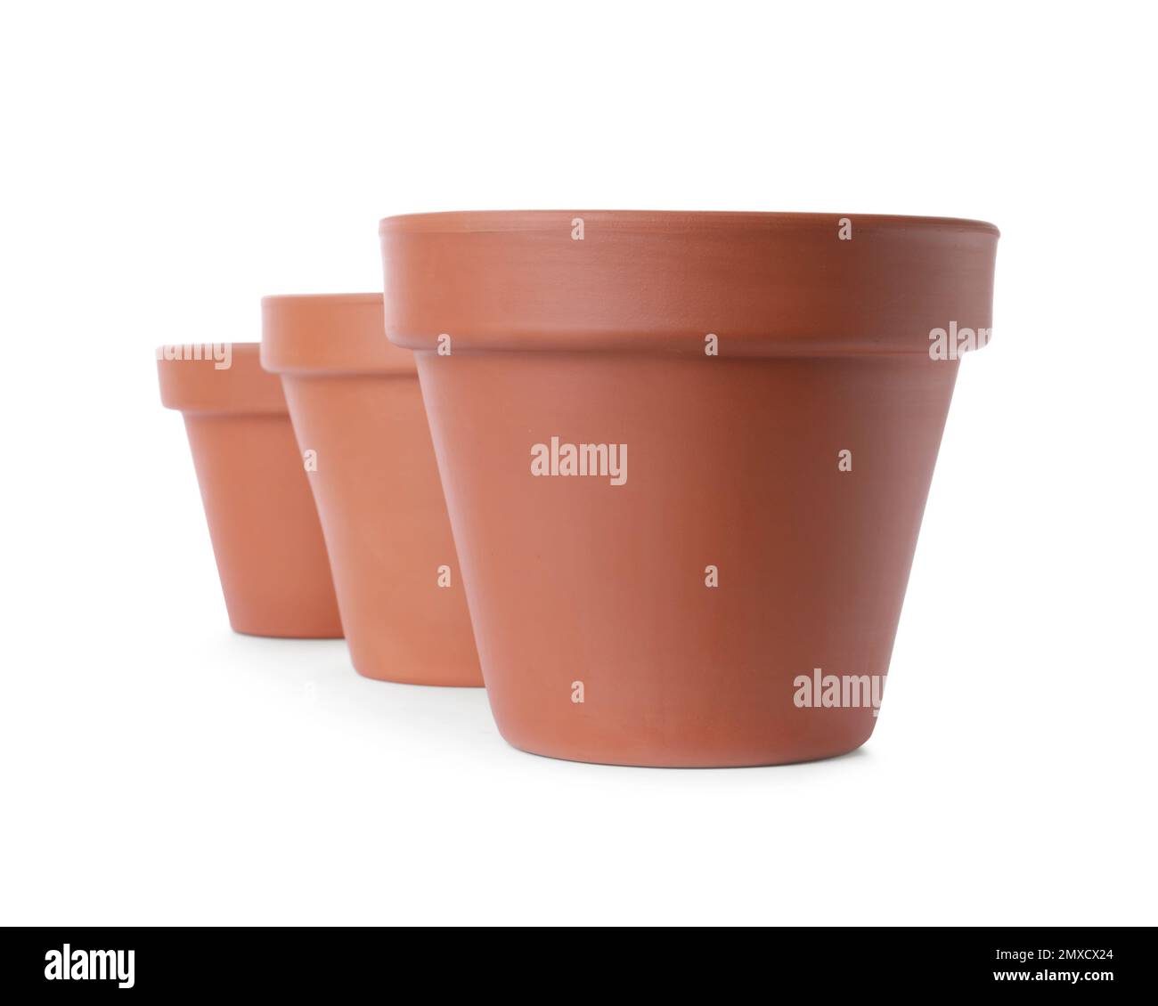 Stylish terracotta flower pots isolated on white Stock Photo - Alamy