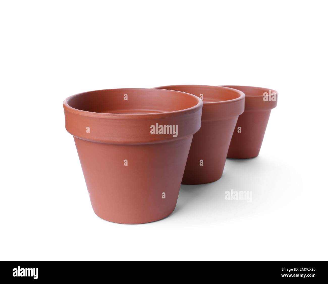 Stylish terracotta flower pots isolated on white Stock Photo - Alamy