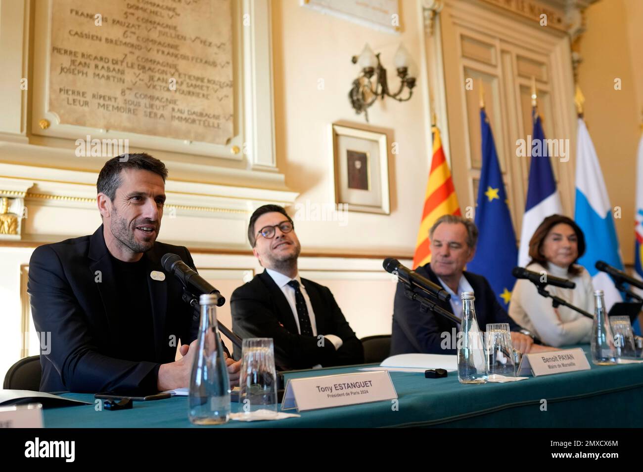 From left, Head of Paris 2024 Olympics Tony Estanguet, Mayor of