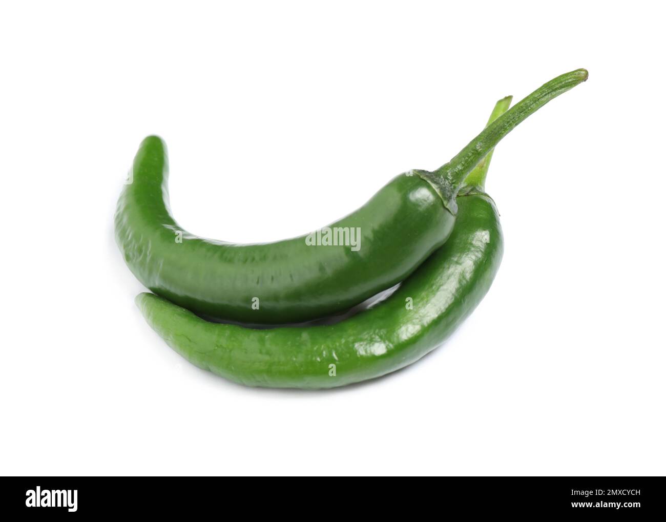 Green hot chili peppers on white background Stock Photo - Alamy
