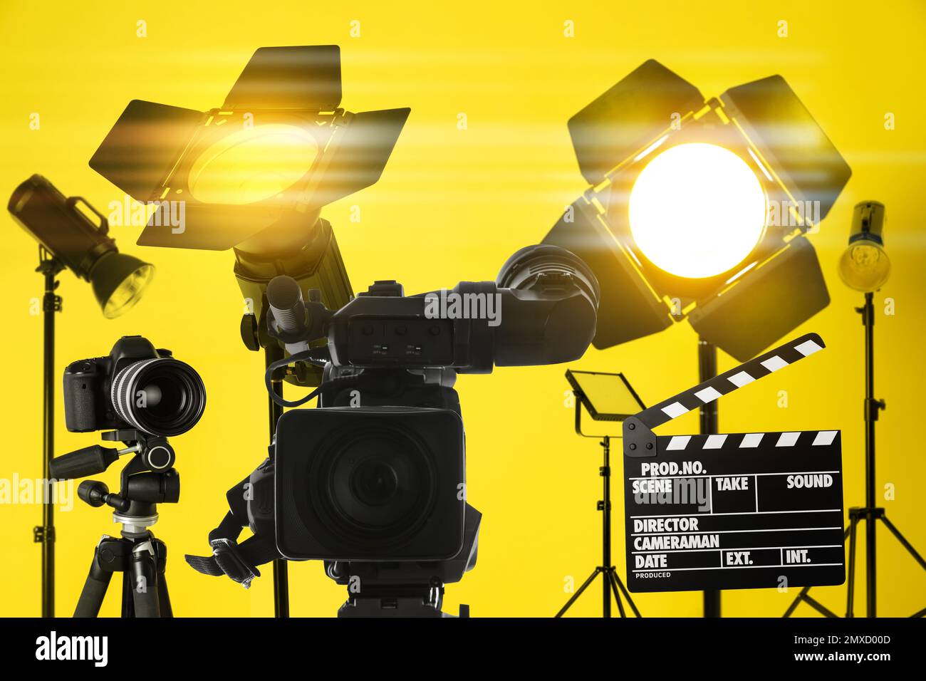 Modern professional video camera and lighting equipment in studio Stock Photo Alamy
