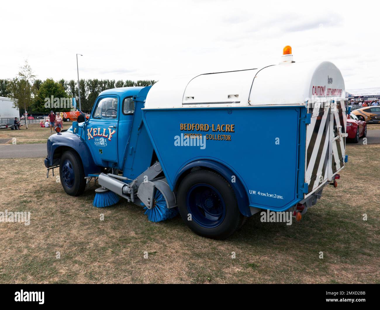 Three-quarters rear view of a  Blue, 1961,Bedford Lacre road sweeper, on display at the 2022 Silverstone Classic Stock Photo