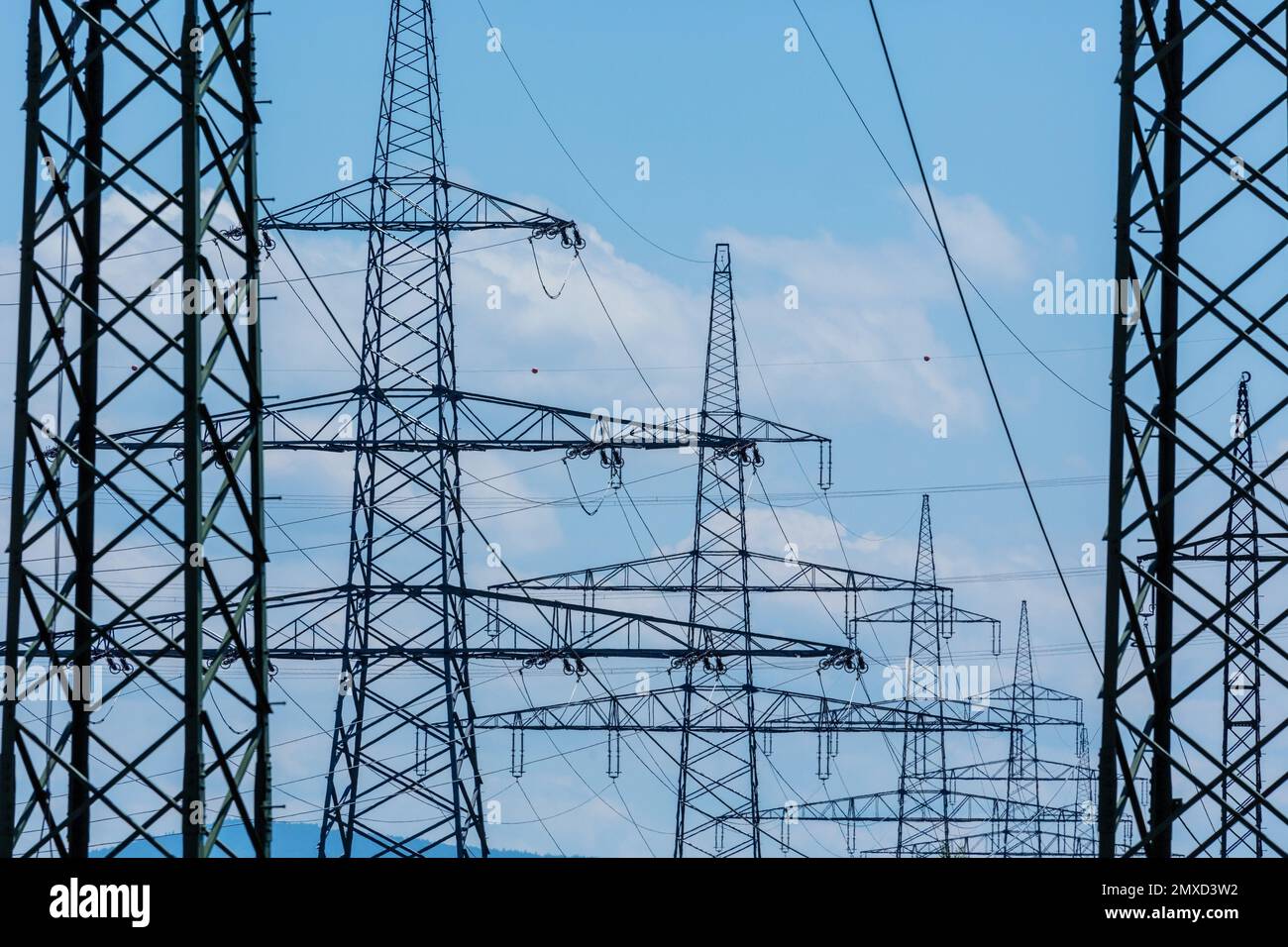 highvoltage transmission poles with power lines, Austria Stock Photo