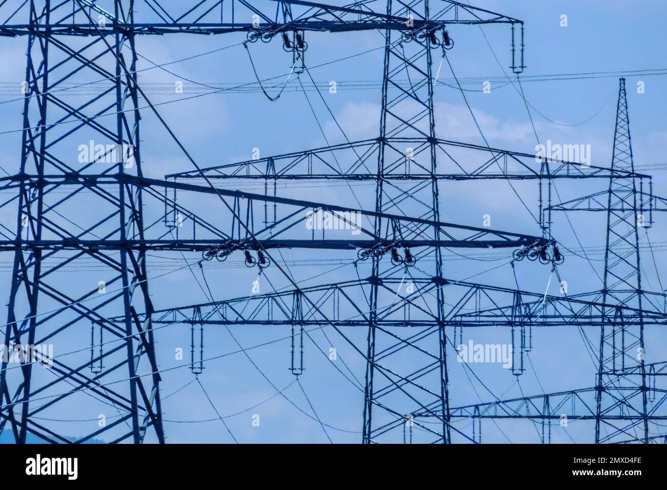 highvoltage transmission poles with power lines, Austria Stock Photo