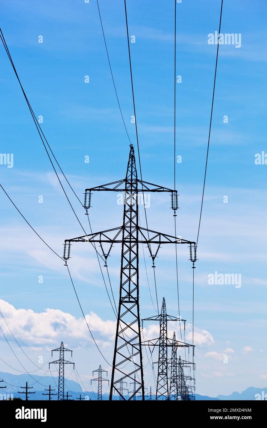 highvoltage transmission poles with power lines, Austria Stock Photo
