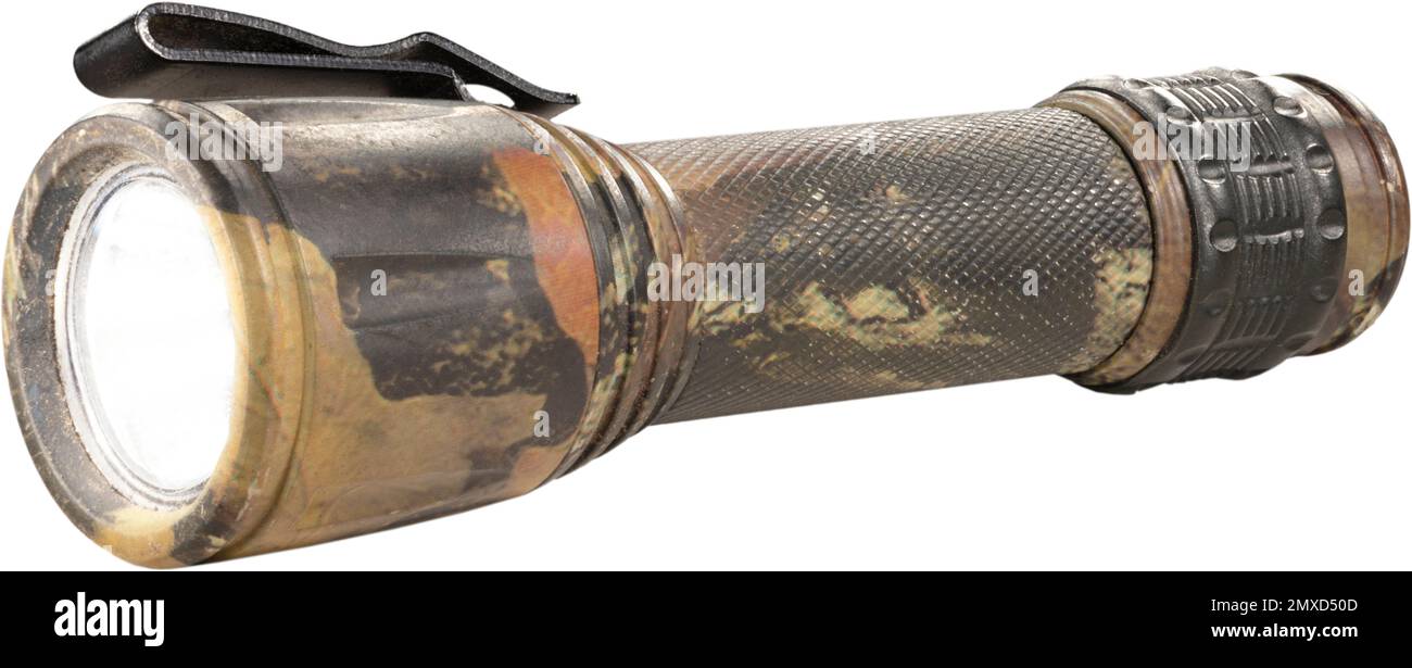 Isolated waterproof flashlight with camo pattern with bulb turned on Stock Photo