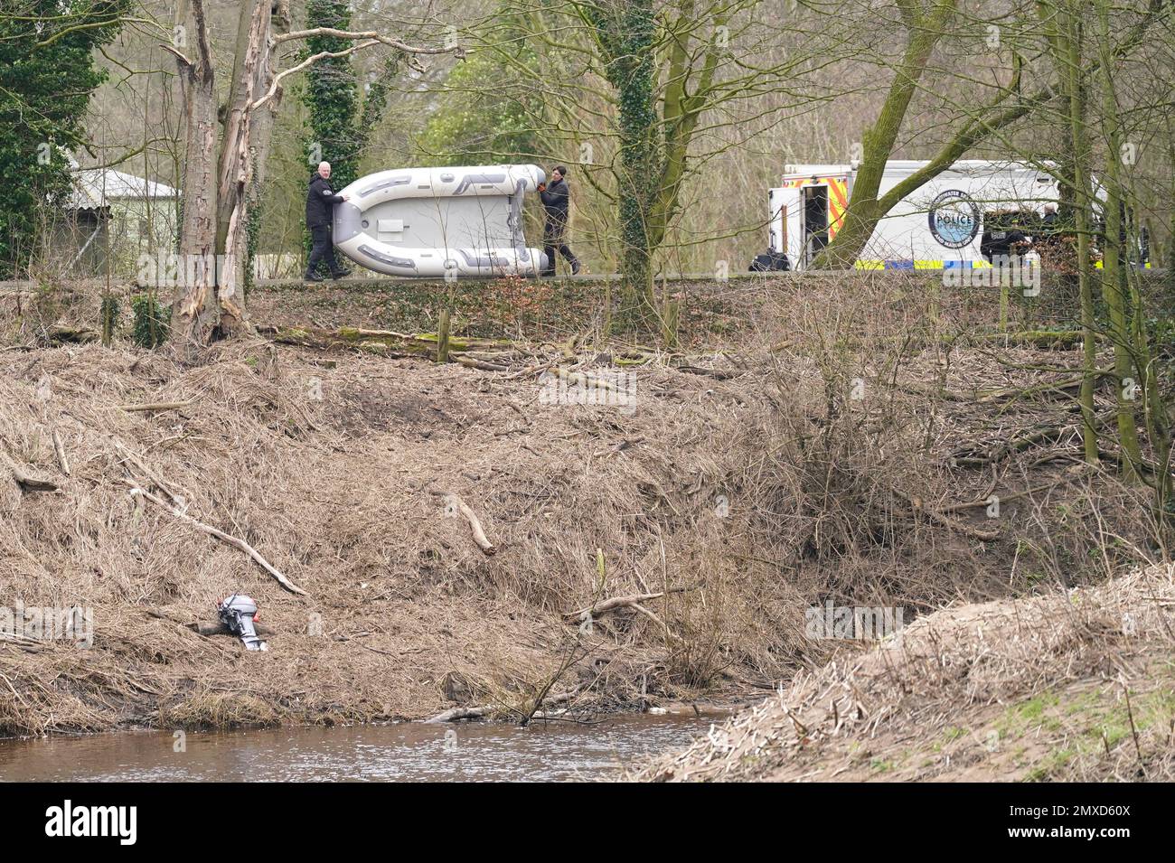 Police officers with a boat in St Michael's on Wyre, Lancashire, as police continue their search for missing woman Nicola Bulley, 45, who was last seen on the morning of Friday January 27, when she was spotted walking her dog on a footpath by the nearby River Wyre. Picture date: Friday February 3, 2023. Stock Photo