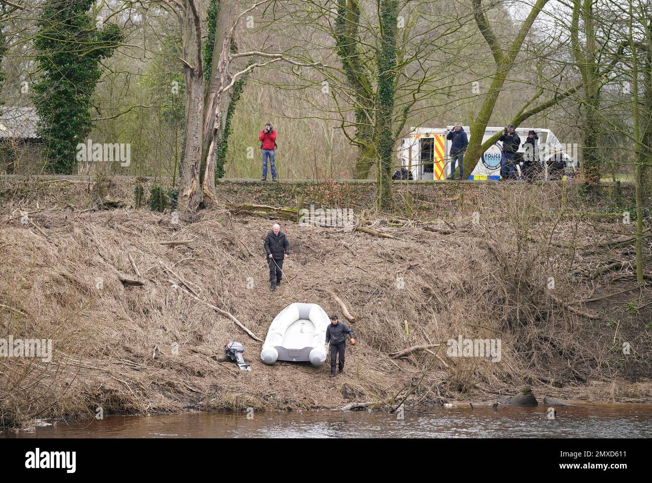 Police officers with a boat in St Michael's on Wyre, Lancashire, as police continue their search for missing woman Nicola Bulley, 45, who was last seen on the morning of Friday January 27, when she was spotted walking her dog on a footpath by the nearby River Wyre. Picture date: Friday February 3, 2023. Stock Photo