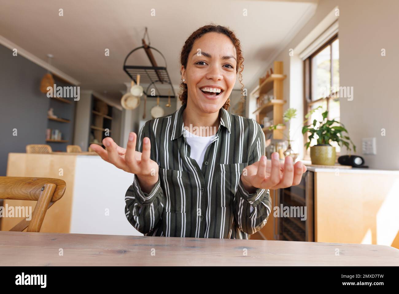 Happy biracial woman having video call Stock Photo