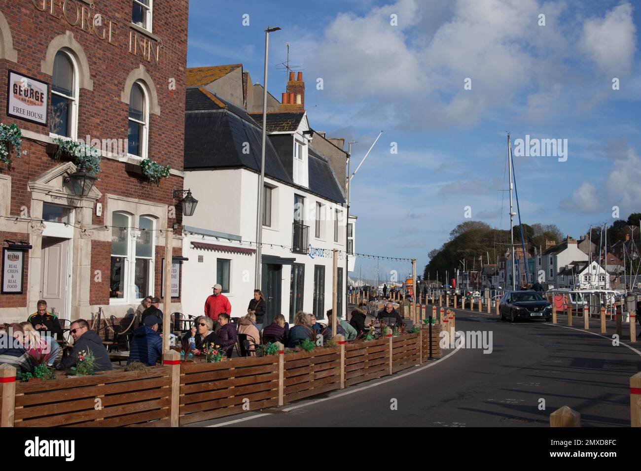 Properties alongside Weymouth Harbour in Dorset in the UK Stock Photo