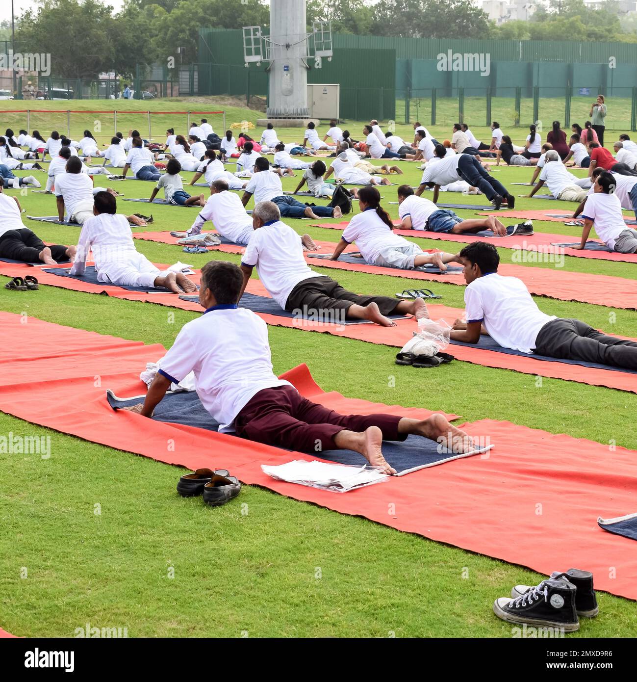 New Delhi, India, June 21 2022 Group Yoga exercise session for people
