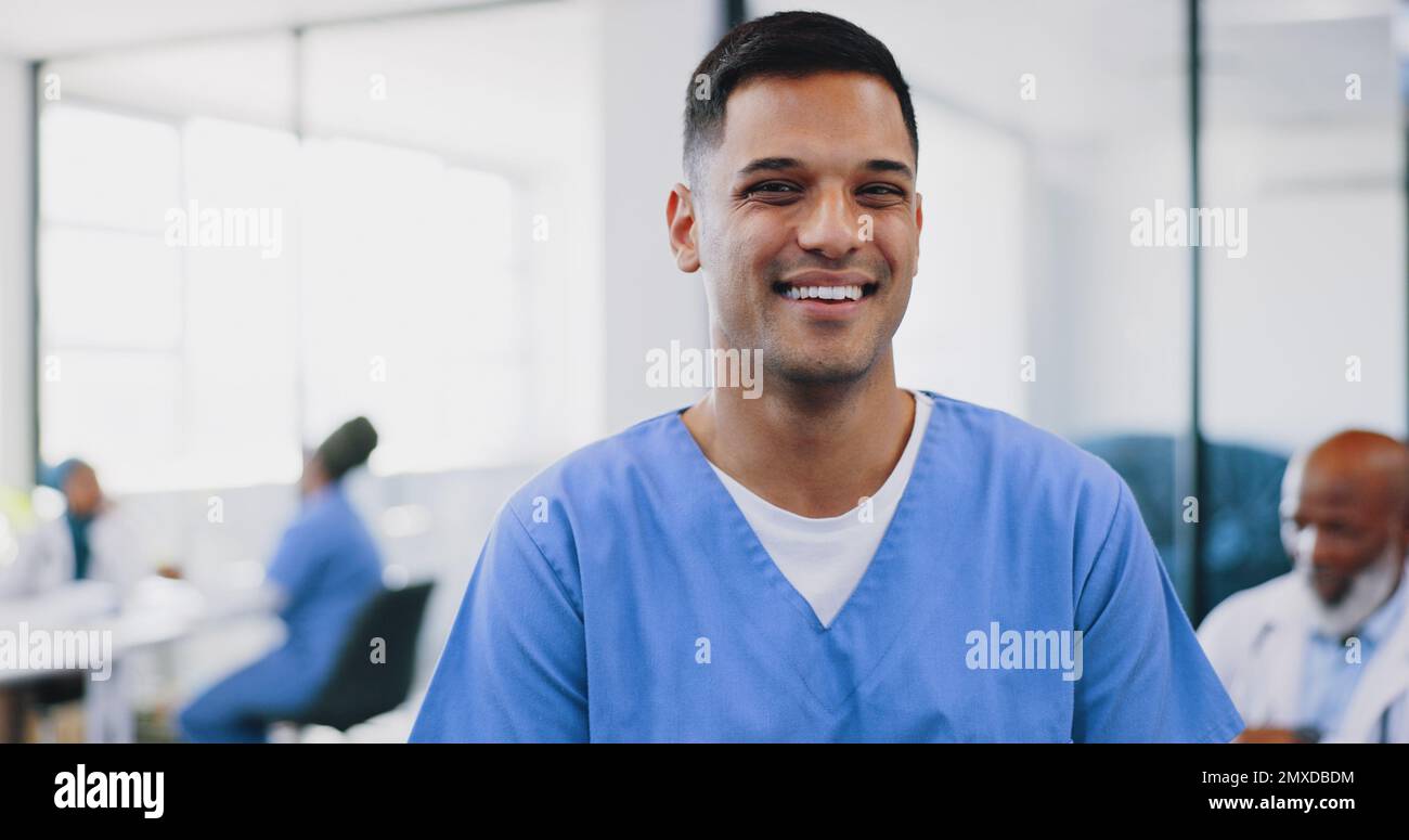 Face, man and happy nurse in hospital, smiling and ready for tasks ...