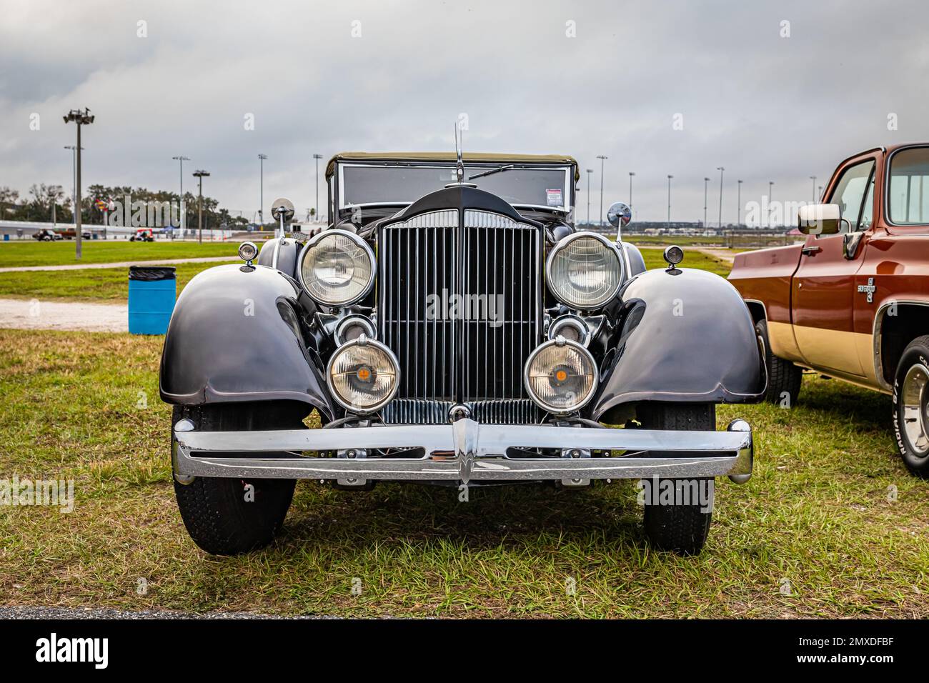 Daytona Beach, FL - November 26, 2022: Low perspective front view of a 1934 Packard Super Eight Convertible Sedan at a local car show. Stock Photo