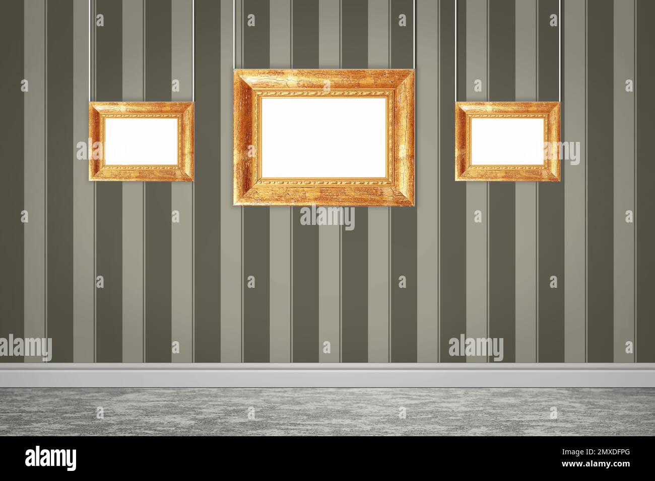 Frames with empty canvases on wall in modern art gallery. Space for