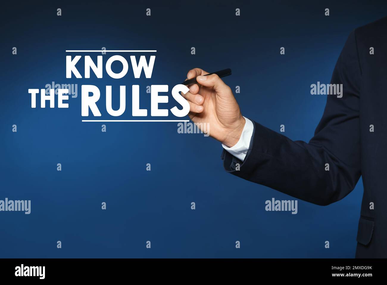 Businessman using virtual screen with phrase Know the rules, closeup Stock Photo