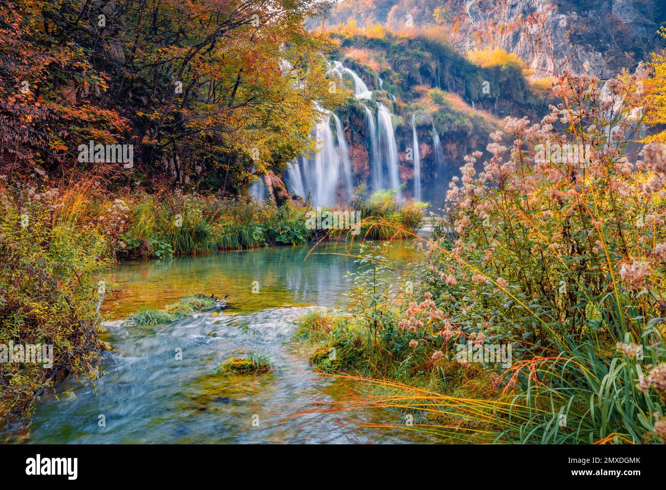 Picturesque morning view of pure water waterfall in Plitvice National Park. Wonderful autumn scene of Croatia, Europe. Abandoned places of Plitvice la Stock Photo