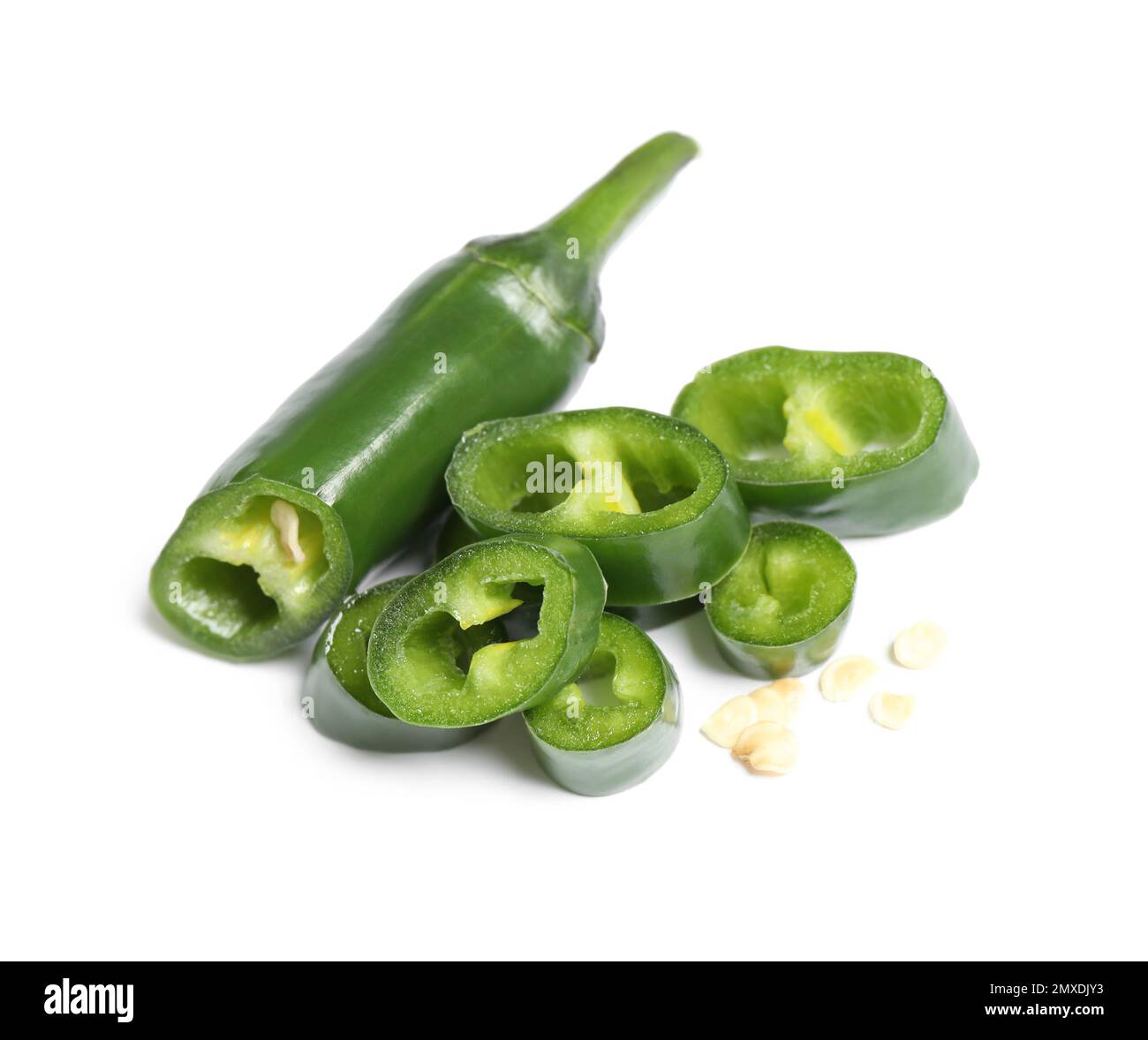 Cut green hot chili pepper on white background Stock Photo - Alamy