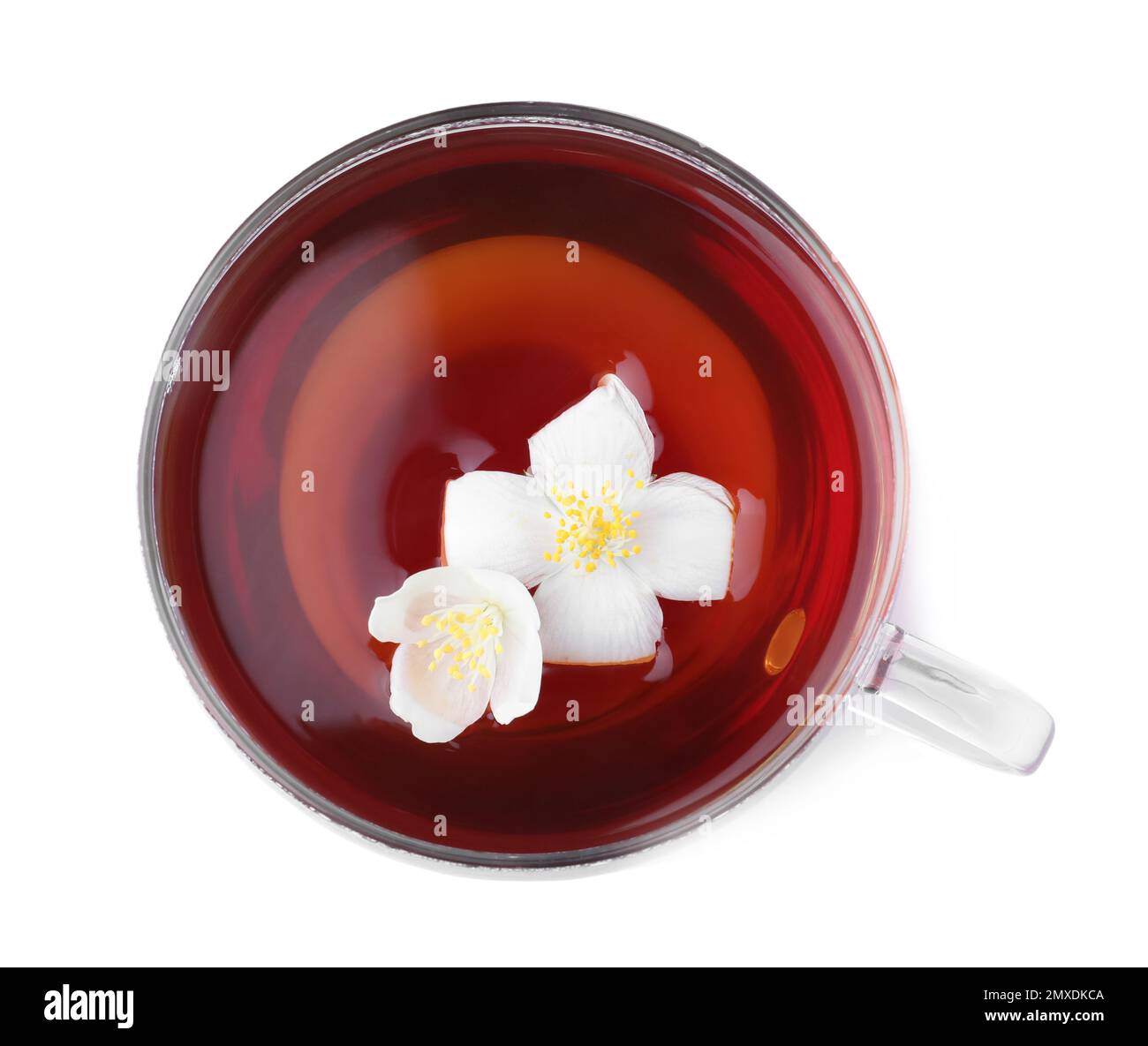 Cup of tea with fresh jasmine flowers isolated on white, top view Stock