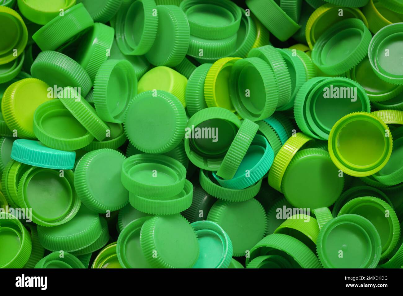 top view green color collection of LDPE plastic bottle cap remove lid