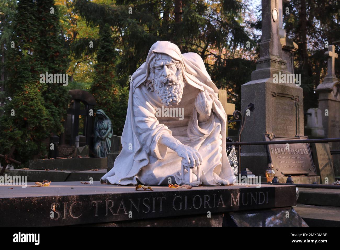 A giant marble statue of an old man set in a city park Stock Photo Alamy