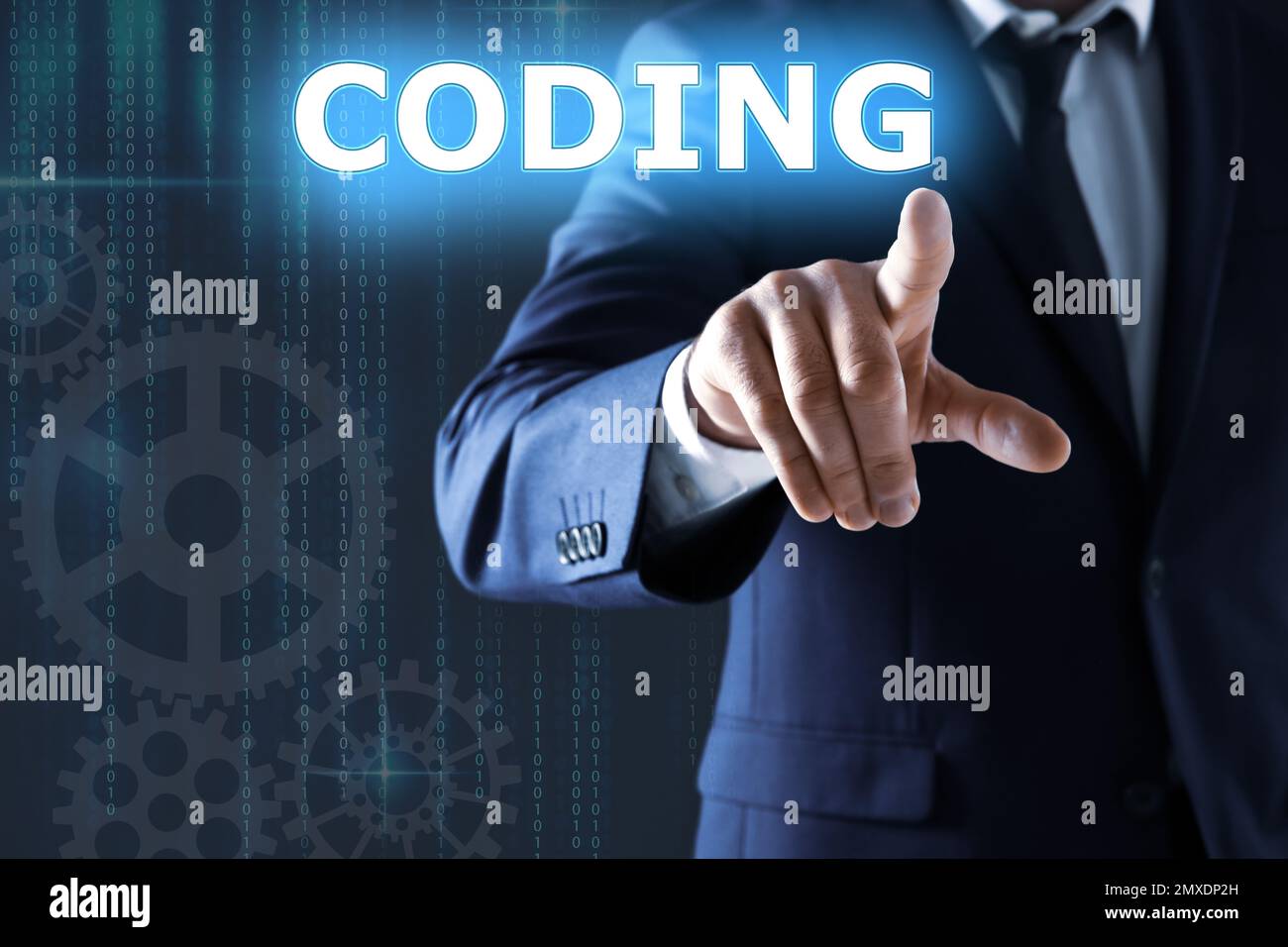 Businessman pointing at word CODING on virtual screen, closeup Stock Photo