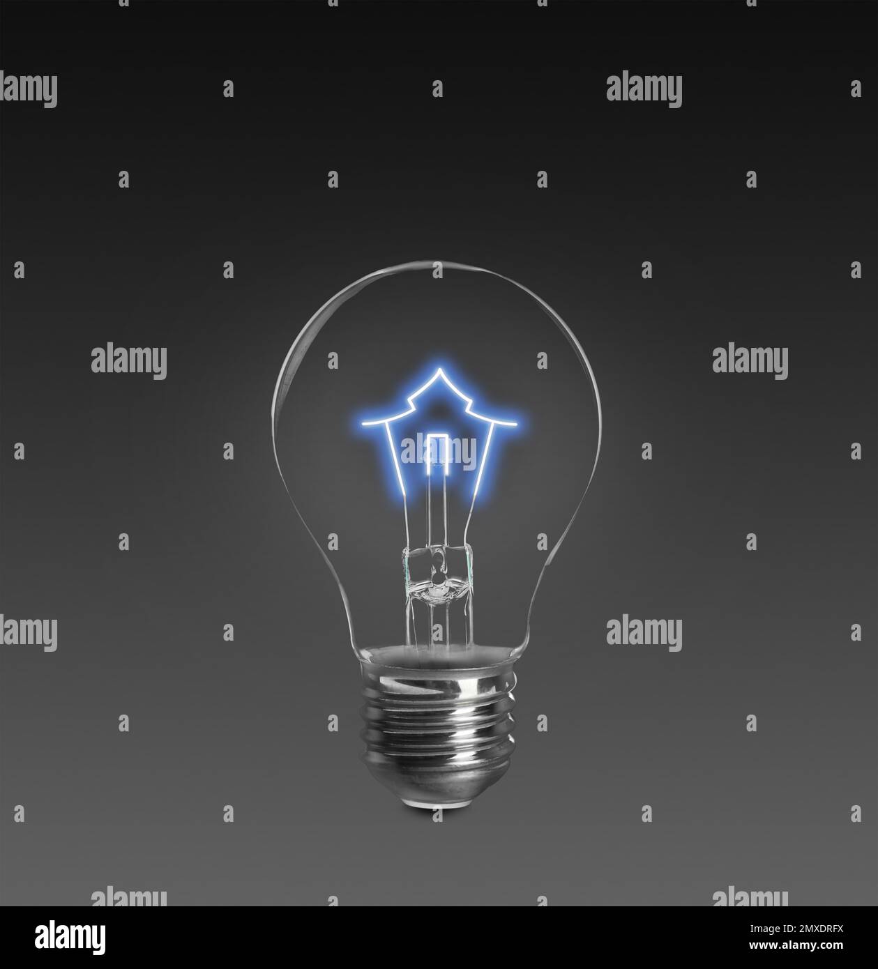 Light bulb with tungsten filament in shape on house on dark background