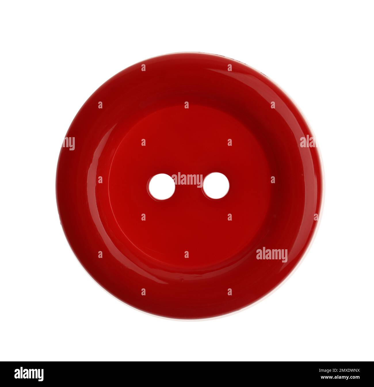 Red plastic sewing button isolated on white Stock Photo