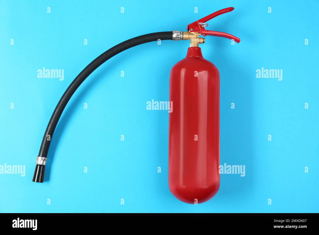 Fire extinguisher on light blue background, top view Stock Photo Alamy