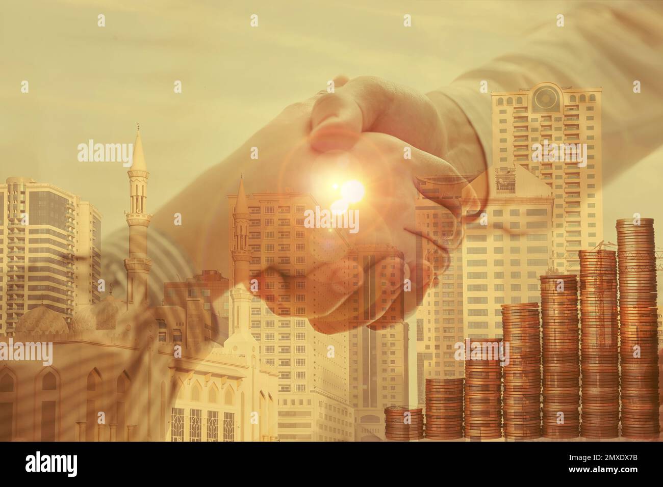 Multiple exposure of partners shaking hands, stacked coins and cityscape, closeup. Business corporation Stock Photo