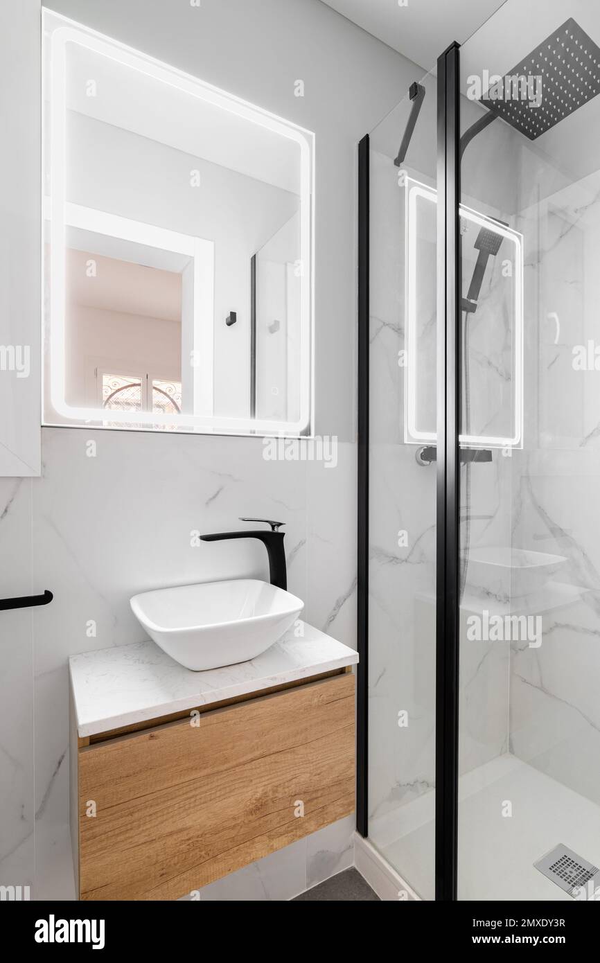 Bathroom with modern designer renovation and fittings. Vanity sink with