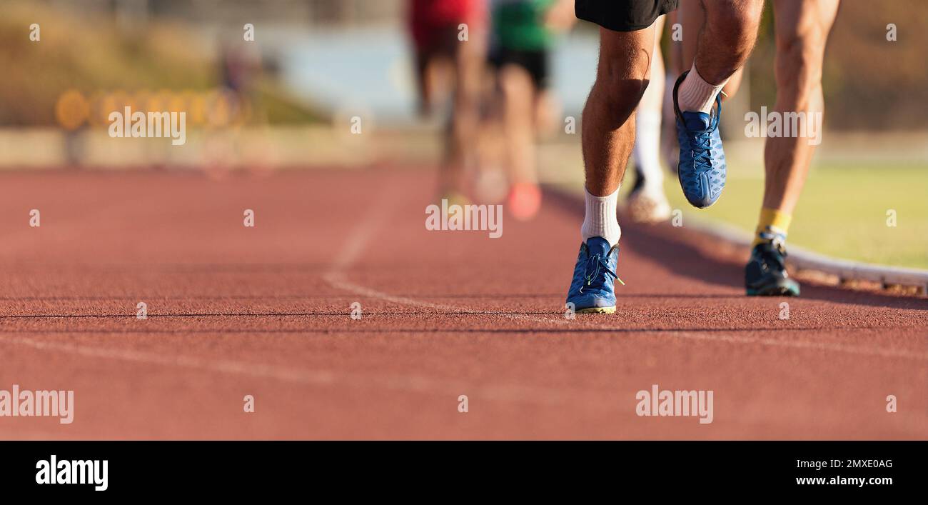 Athletics people running on the track field Stock Photo Alamy